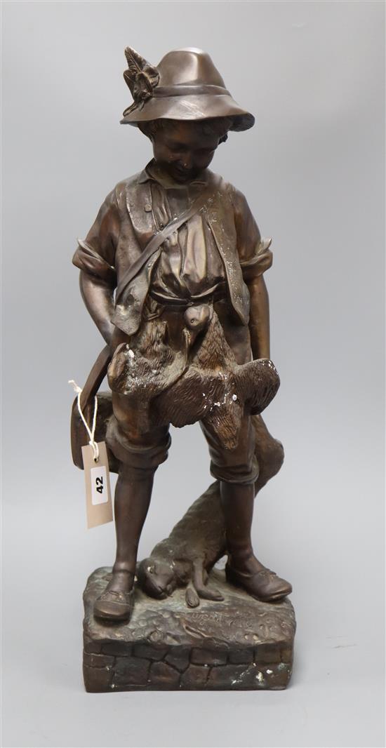 A 20th century bronze of a boy hunter, signed height 52cm